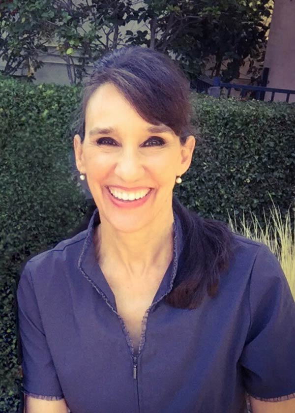 Dental hygienist Mindy